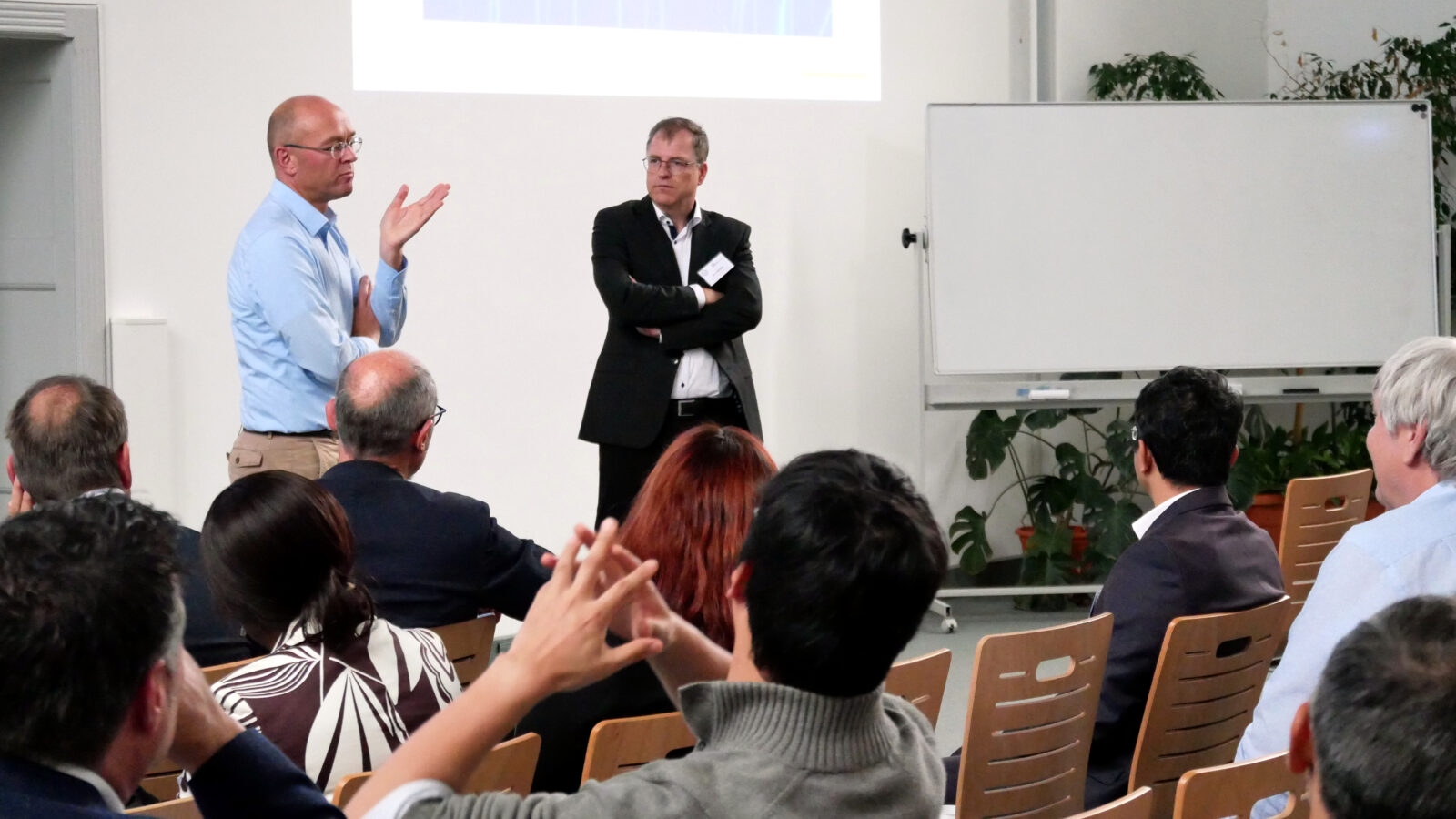 Lutz Hofmann and Jan Meyer during the speakers session